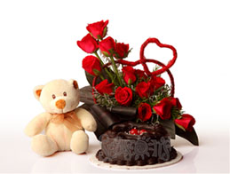 12 Red roses basket+1/2 Kg cake+Teddy