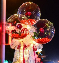 3 Red Roses rose inside 3 transparent balloon with red and White Wrapping with fairy light