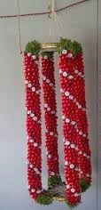 Layers of flowers in Red and White in slant in 2 garlands