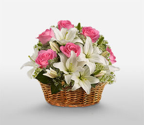 Pink roses with white lilies basket