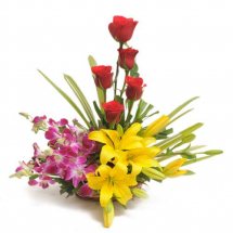 6 Red roses 2 Yellow lilies 6 purple orchids basket