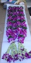 A pair of Purple Orchid Garlands for Bride & Groom